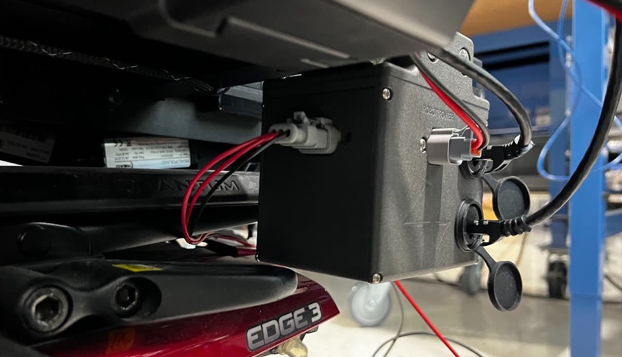 prototype build of the nuc enclosure mounted on the wheelchair